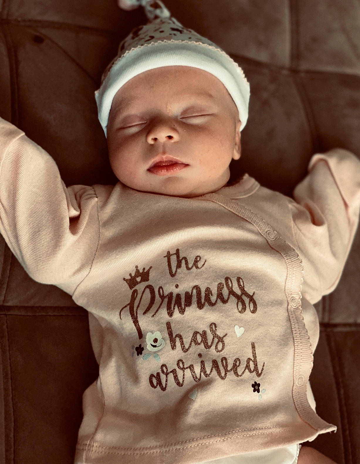 Marilynn is registered to the contest to win money with this photo: baby, cheek, child, cool, happy, head, headgear, headwear, person, product, sleeve, smile, toddler