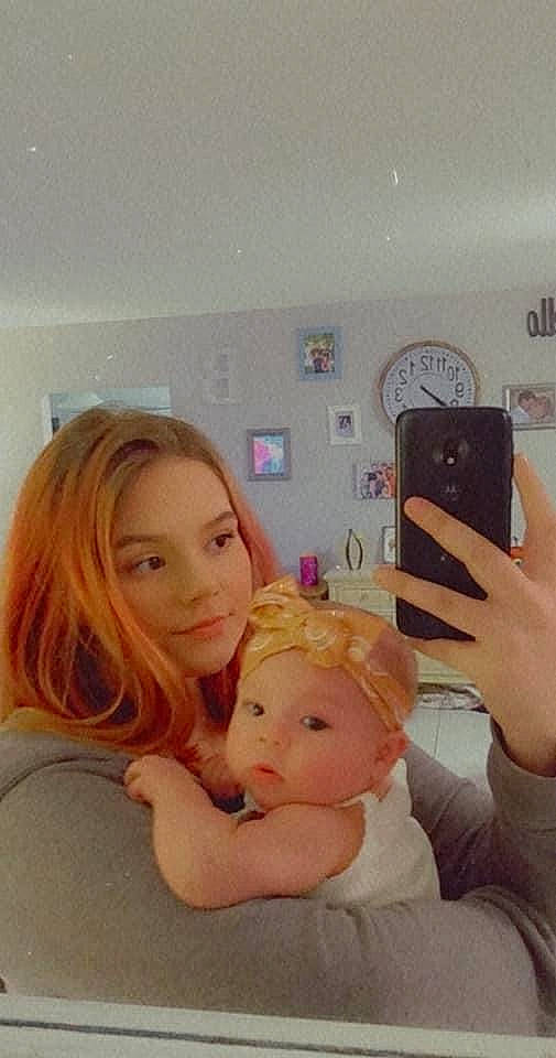 Marilynn is registered to the contest to win money with this photo: blond, child, electronic_device, headwear, person, photography, selfie, technology, thumb