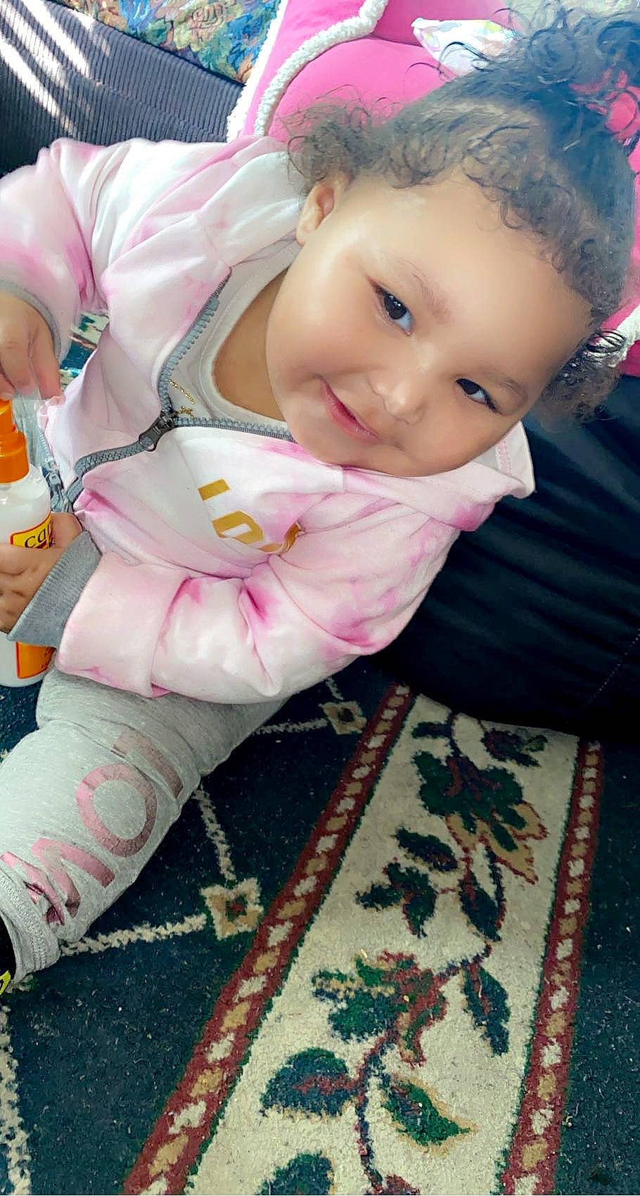 Analia joined the competition — help win amazing prizes! baby, baby_toddler_clothing, beauty, cheek, child, flooring, fun, hairstyle, joy, linens, lip, magenta, pattern, person, photograph, pink, sitting, skin, sleeve, smile