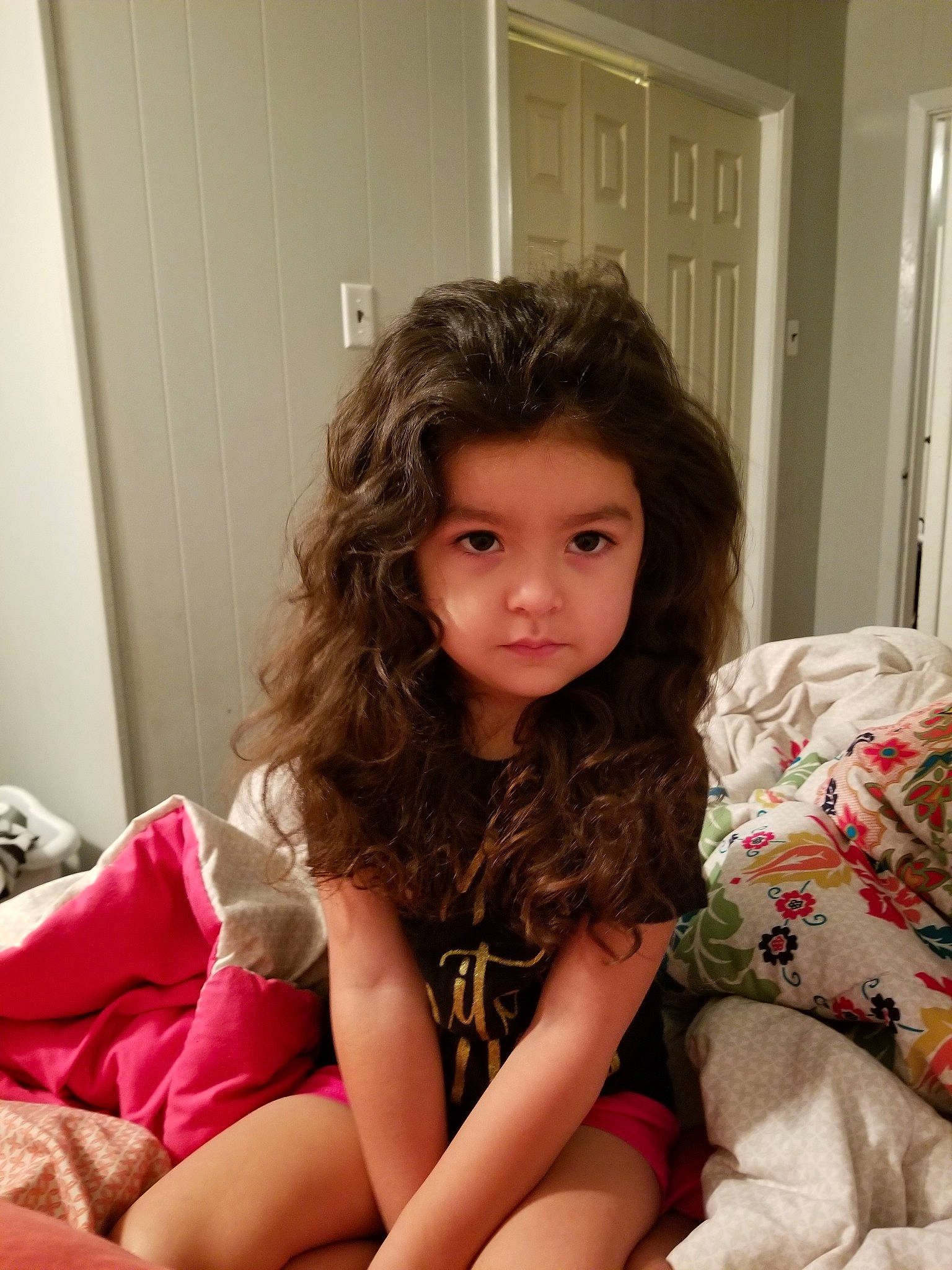 Celia is registered to the contest to win money with this photo: beauty, black_hair, brown_hair, child, child_model, daughter, face, finger, hair, hair_coloring, hairstyle, leg, long_hair, person, room, sitting, skin, smile, thigh, toddler