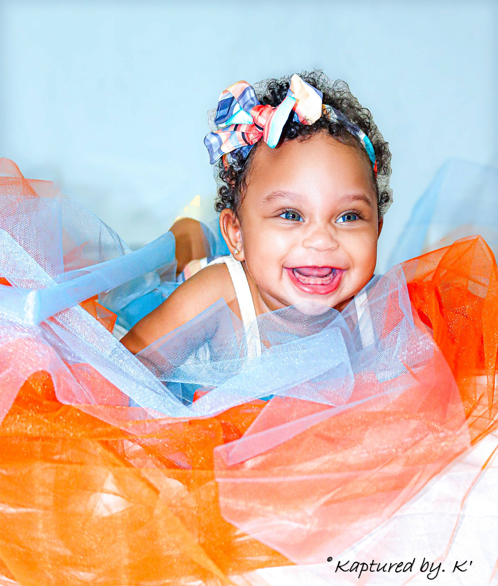 Trinity is registered to the contest to win money with this photo: baby_toddler_clothing, child, costume, electric_blue, fashion_accessory, flash_photography, fun, hair_accessory, happy, headband, headpiece, jewellery, joy, leisure, orange, peach, person, personal_protective_equipment, play, recreation