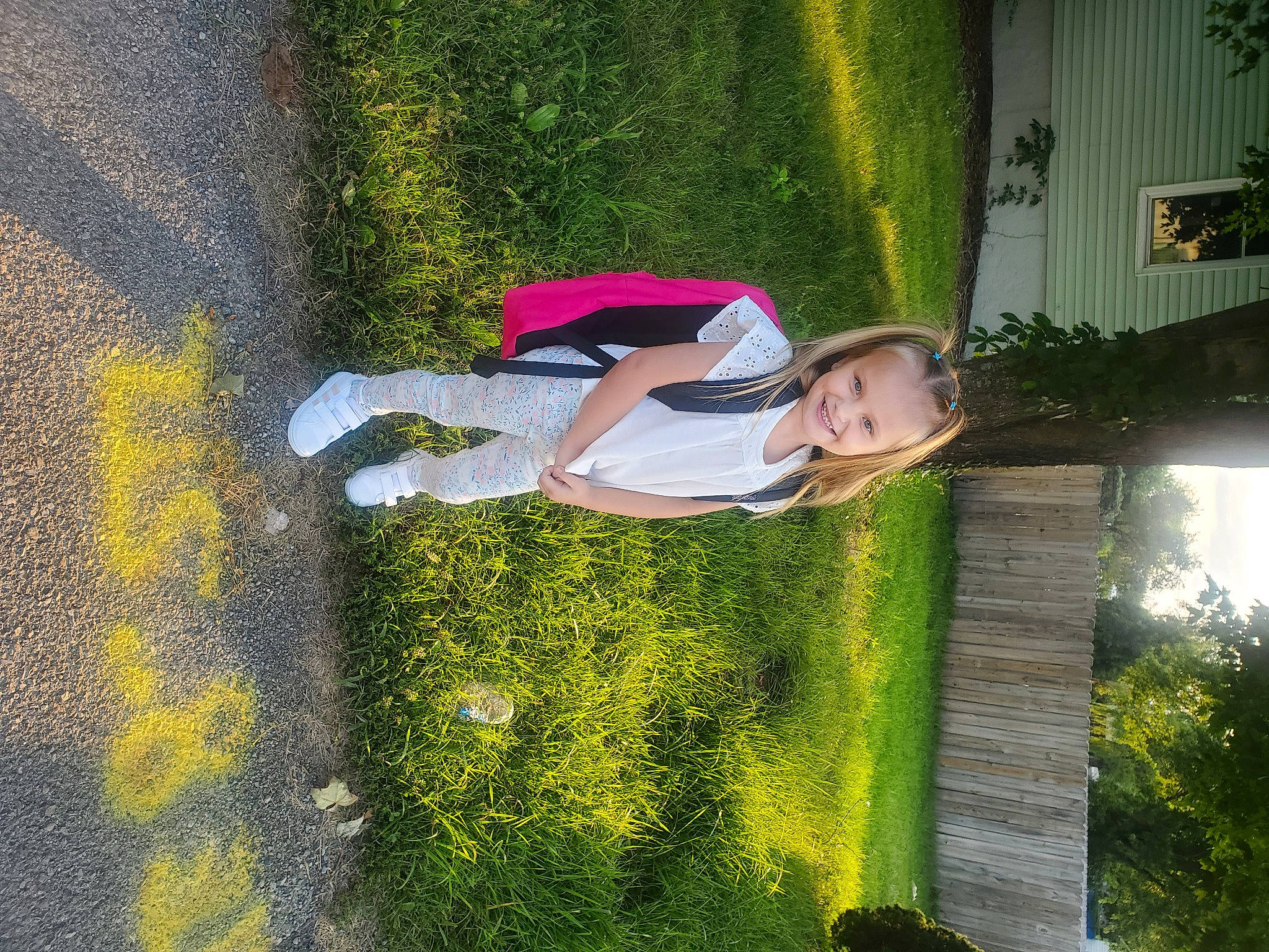 Delaney joined the competition — help win amazing prizes! asphalt, fun, garden, grass, green, happy, joy, landscape, leisure, people_in_nature, person, plant, road_surface, shadow, shrub, sidewalk, smile, tar, tints_and_shades, toddler