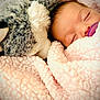 Lilith is registered to the contest to win money with this photo: baby, sleeping, blanket, pink, pacifier, plush_toy, soft, cozy, child, face, cute, rest, comfort, warm, infant, closeup, snuggle, peaceful, indoors, toddler