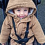 Paolo a rejoint le concours — aidez-le/la à gagner de superbes lots ! toddler, child, smiling, hood, corduroy, jacket, stroller, outdoor, seatbelt, baby, clothing, cute, happy, face, person, young_child, casual, warm_clothing, park, daytime