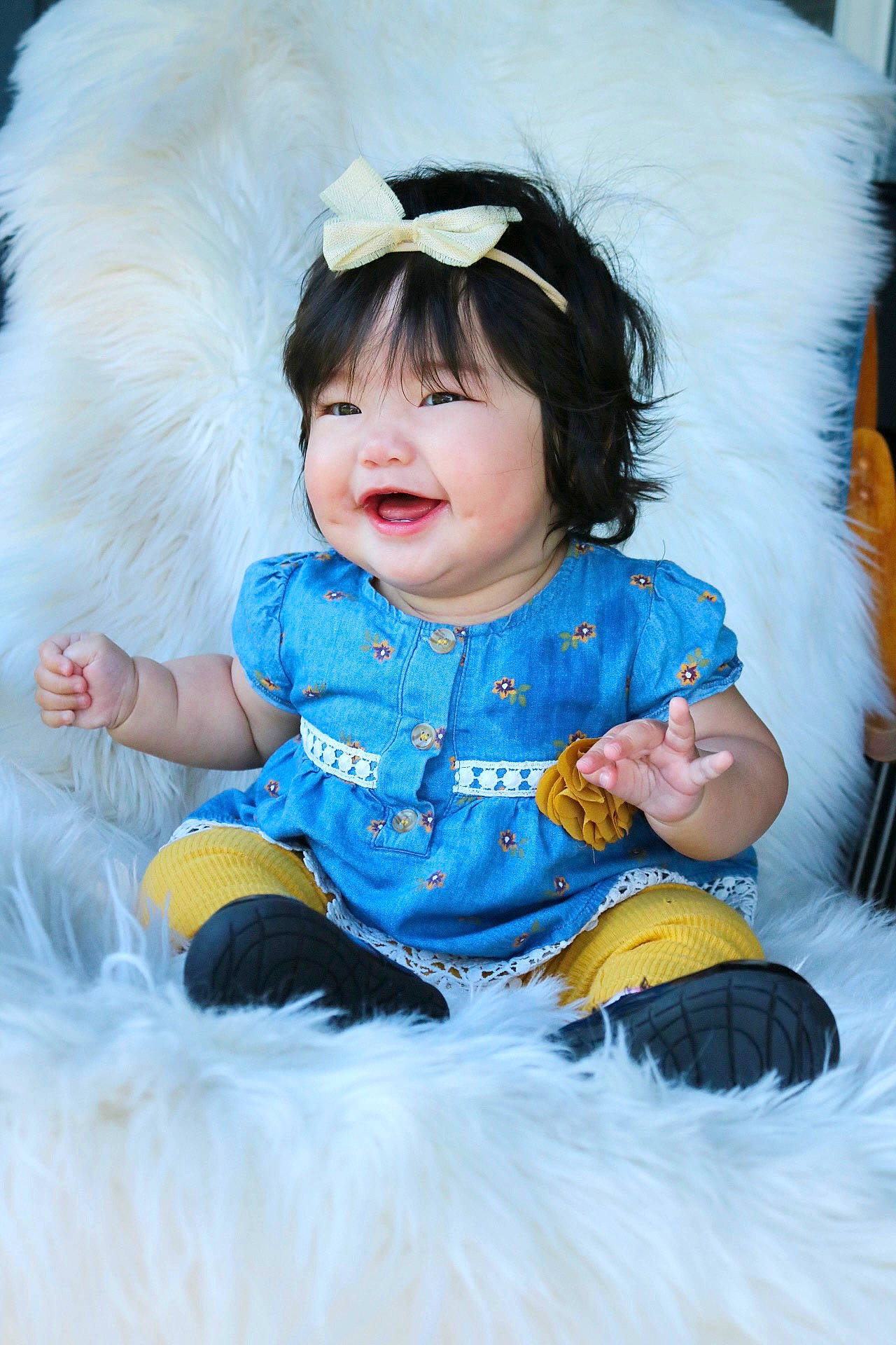 Arya is registered to the contest to win money with this photo: azure, baby, baby_toddler_clothing, child, costume, eye, flash_photography, fun, fur, goggles, happy, head, iris, person, sitting, skin, sleeve, smile, t_shirt, textile