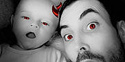 Hadès participe au concours pour gagner de l'argent avec cette photo : baby, man, face, people, red_eyes, devil_horns, black_and_white, selfie, plush_toy, smiling, fun, indoors, closeup, expression, cute, parent_and_child, filter, toy, portrait, lying_down