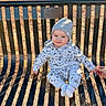 baby, child, infant, sitting, bench, park, outdoor, autumn, leaves, sunlight, knit_hat, winter_clothing, onesie, socks, smiling, portrait, face, hand, family, playground