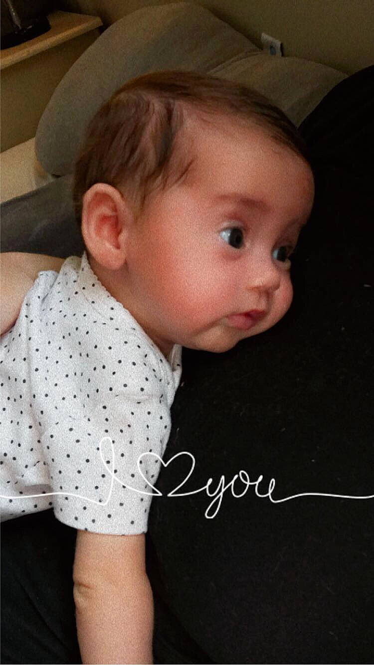 Kehlani joined the competition — help win amazing prizes! baby, baby_toddler_clothing, blond, brown_hair, cheek, child, collar, comfort, dress_shirt, ear, eyelash, fashion_accessory, linens, neck, nose, pattern, person, sitting, skin, sleeve