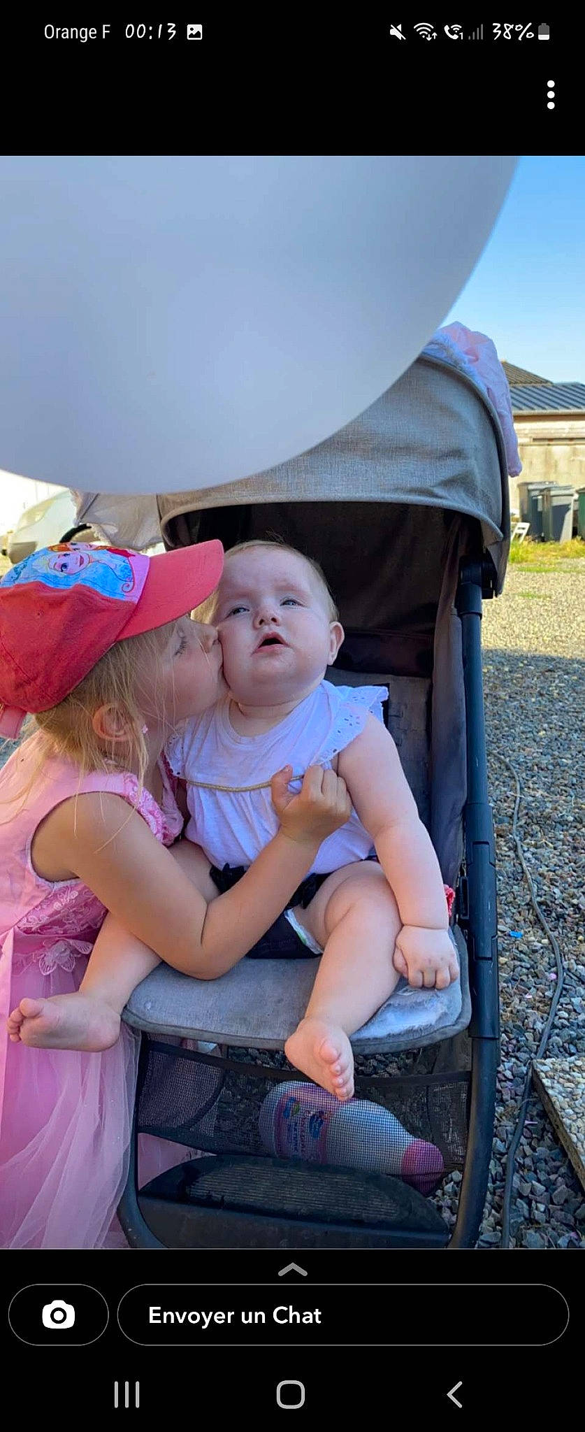 Elyannah participe au concours pour gagner de l'argent avec cette photo : baby, chair, child, comfort, event, fashion_accessory, fun, grass, happy, hat, lap, leisure, person, pink, purple, recreation, sandal, sitting, sun_hat, toddler
