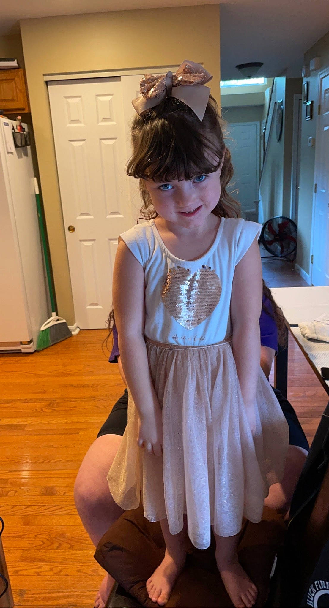 Athena joined the competition — help win amazing prizes! baby_toddler_clothing, cabinetry, chair, drawer, dress, floor, flooring, happy, human_leg, joint, joy, knee, neck, person, shoulder, sleeve, sock, sunglasses, table, thigh