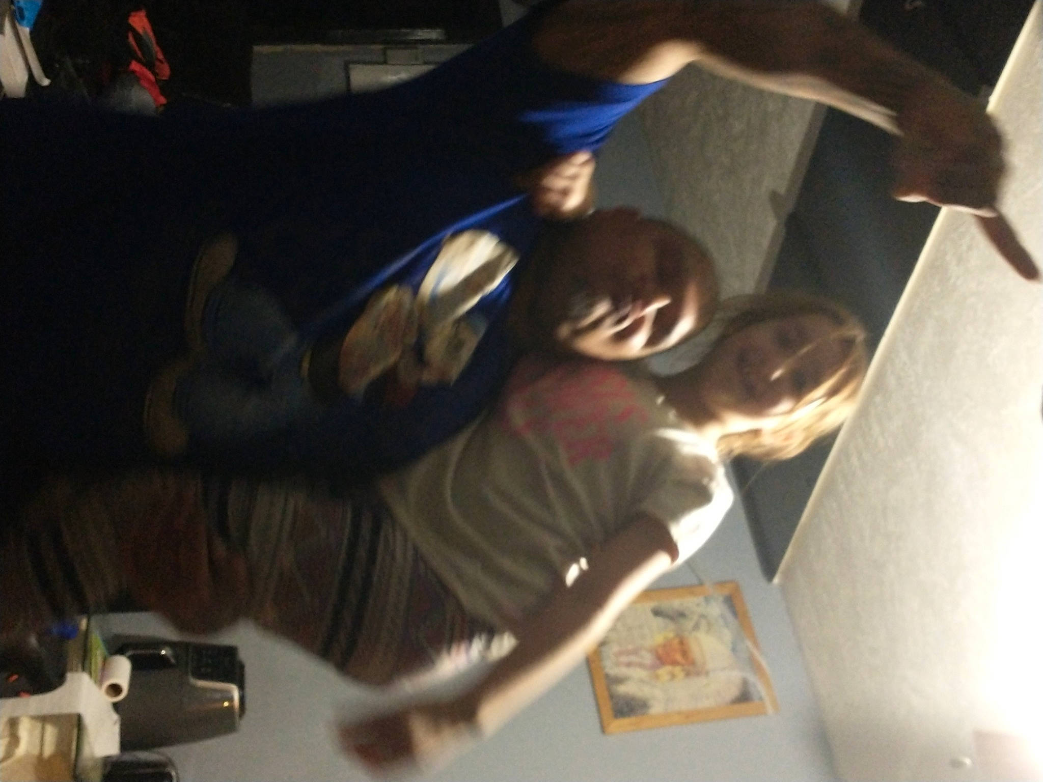 Angelique is registered to the contest to win money with this photo: auto_part, ball, camera, elbow, engineering, eyewear, fun, gesture, hat, human_leg, joy, machine, person, room, single_lens_reflex_camera, thigh, video_camera, wood, wrist