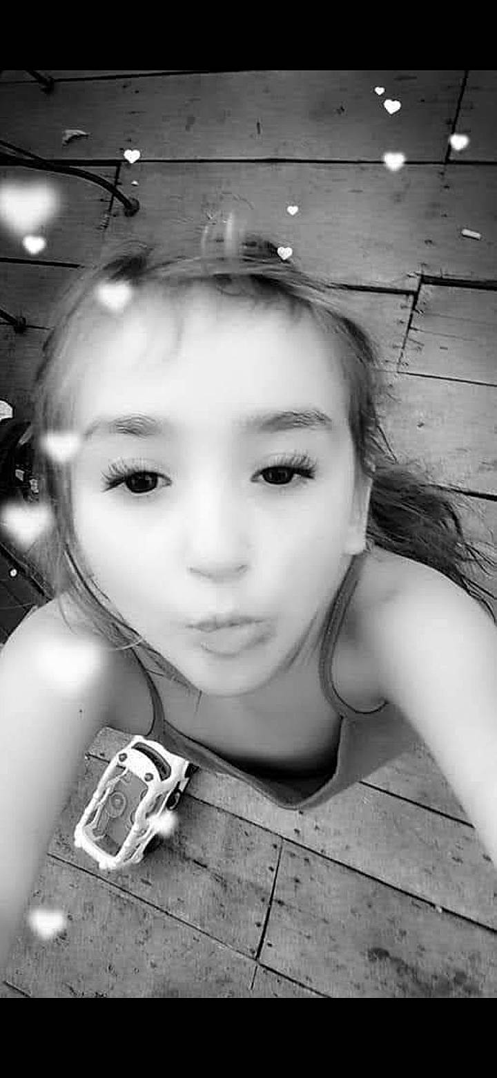 Angelique is registered to the contest to win money with this photo: arm, black, chin, eye, eyebrow, eyelash, flash_photography, forehead, hairstyle, hand, human, lip, mouth, nose, organ, person, photograph, shoulder, skin, smile