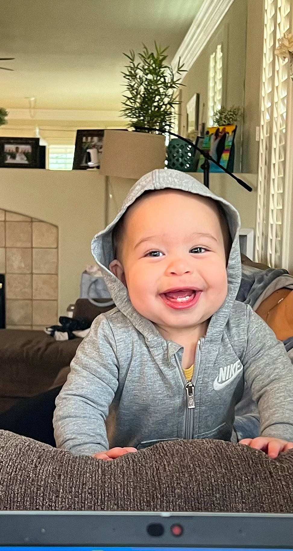 Khalil joined the competition — help win amazing prizes! baby, baby_toddler_clothing, cheek, child, comfort, fashion_accessory, flash_photography, flooring, fun, happy, headwear, joy, laugh, person, picture_frame, portrait_photography, room, sitting, skin, sleeve