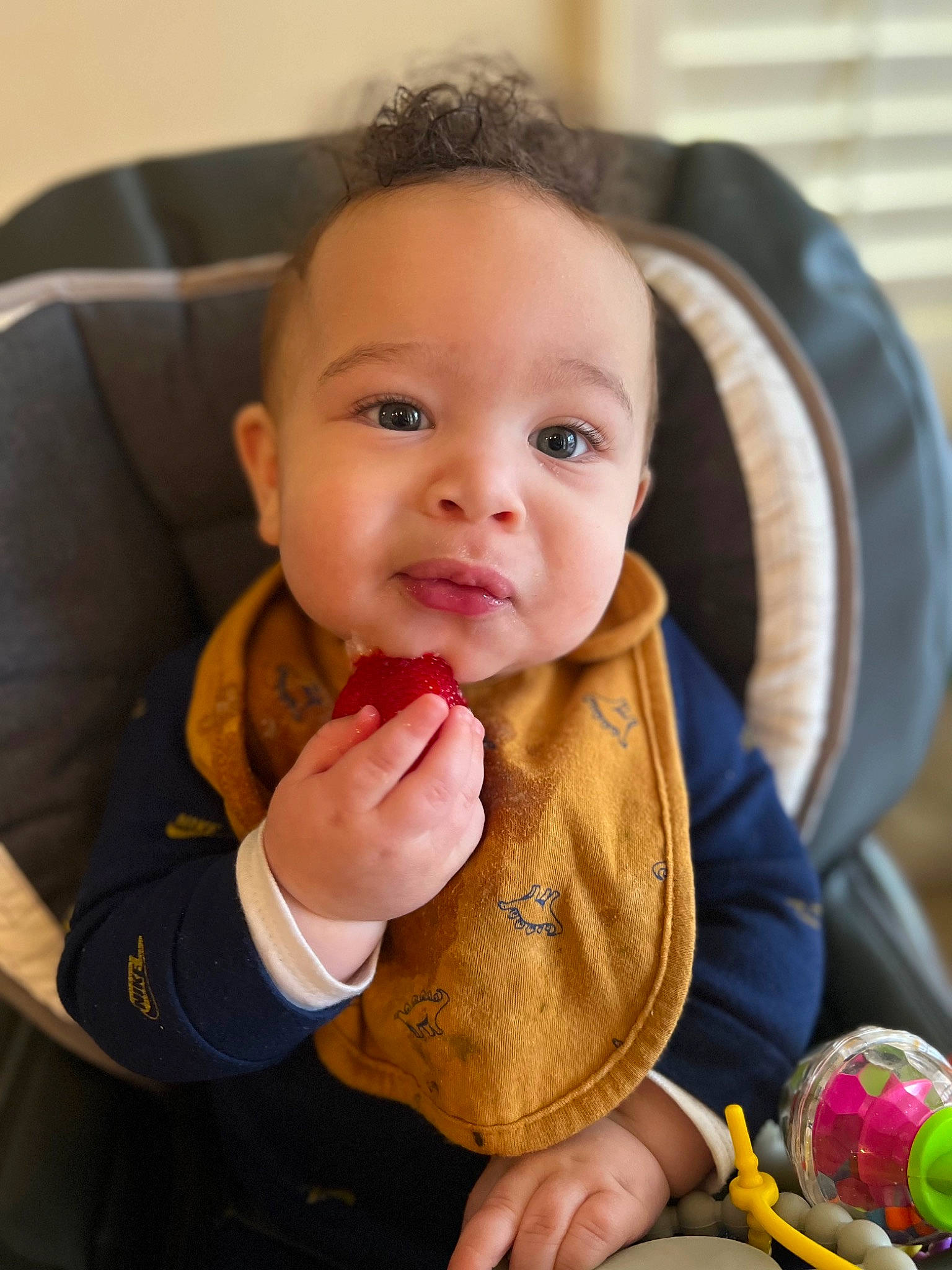 Khalil is registered to the contest to win money with this photo: baby, baby_carriage, baby_products, baby_toddler_clothing, cheek, child, facial_expression, finger, fun, gesture, hand, happy, iris, lip, nail, nose, person, sitting, skin, smile