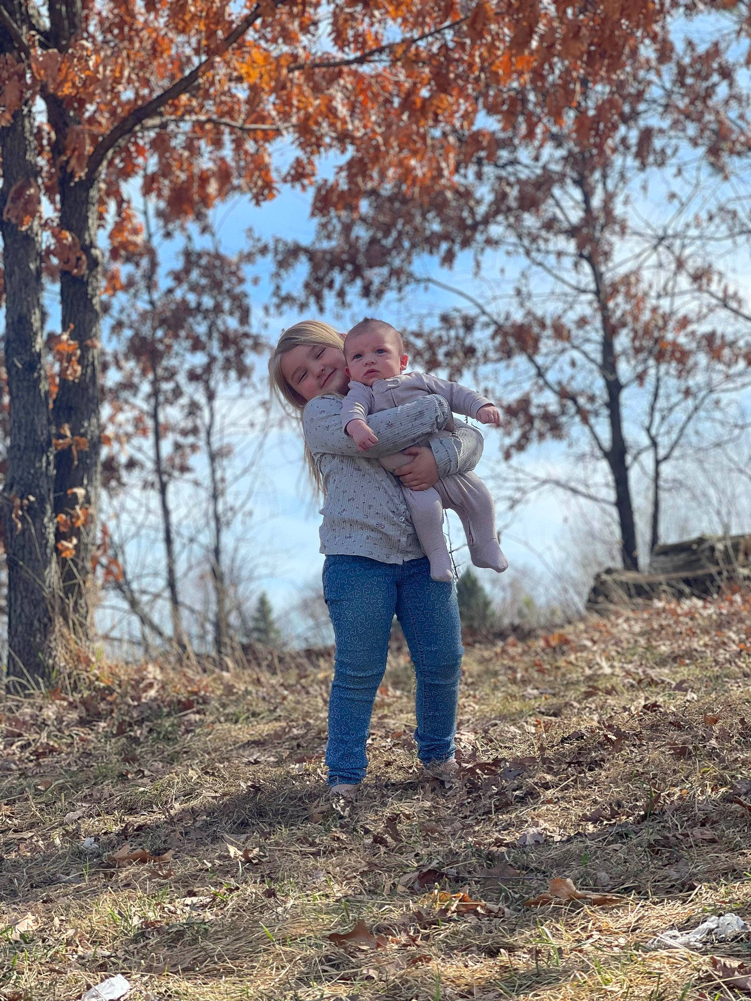 Brooklyn joined the competition — help win amazing prizes! deciduous, forest, fun, gesture, grass, hair, happy, jeans, joy, landscape, love, natural_landscape, people_in_nature, person, plant, romance, sky, tree, trunk, twig