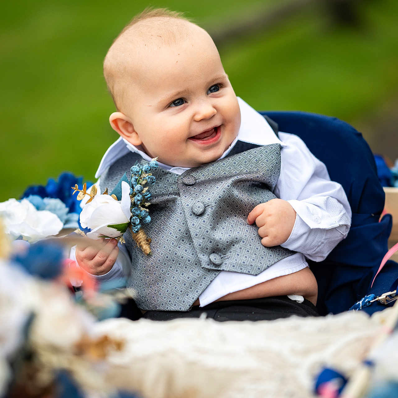 Parker joined the competition — help win amazing prizes! baby, bodypart, clothing, dress, face, finger, flower, flowerarrangement, flowerbouquet, hand, happy, head, knitwear, pants, person, photography, plant, portrait, rose, smile