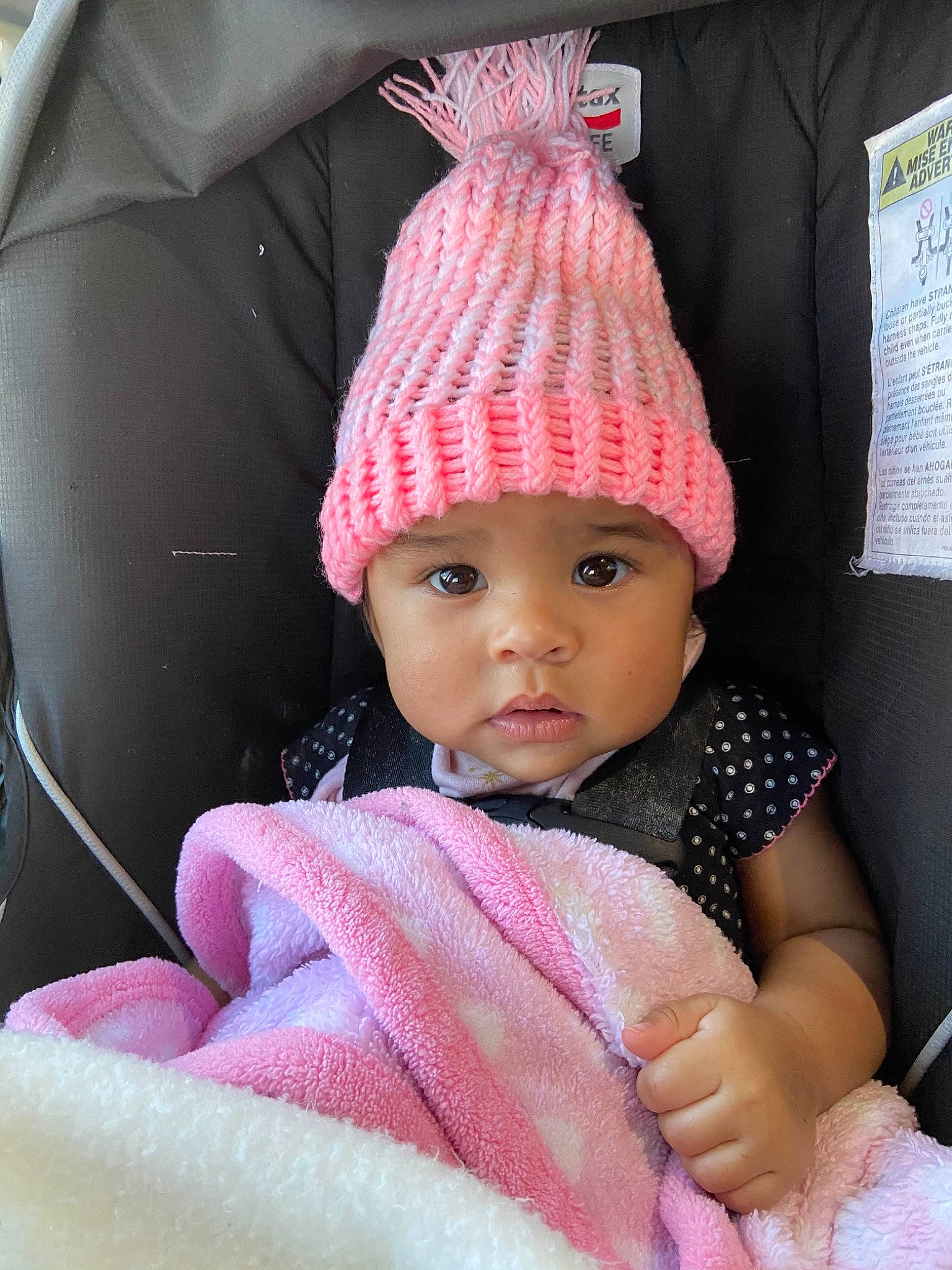 Malaiya is registered to the contest to win money with this photo: baby, baby_products, bonnet, child, headgear, headwear, knit_cap, knitting, person, pink, toddler