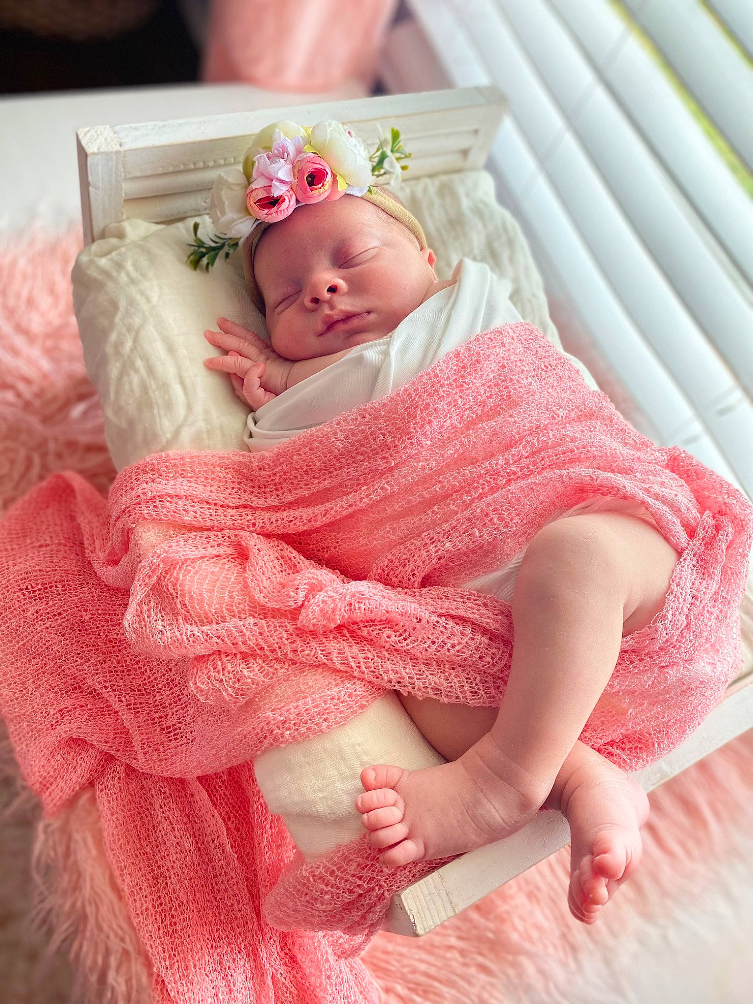 Raelyn is registered to the contest to win money with this photo: baby, baby_sleeping, baby_toddler_clothing, comfort, finger, hat, headband, headpiece, jewellery, linens, magenta, pattern, peach, person, petal, pink, product, rose, skin, textile
