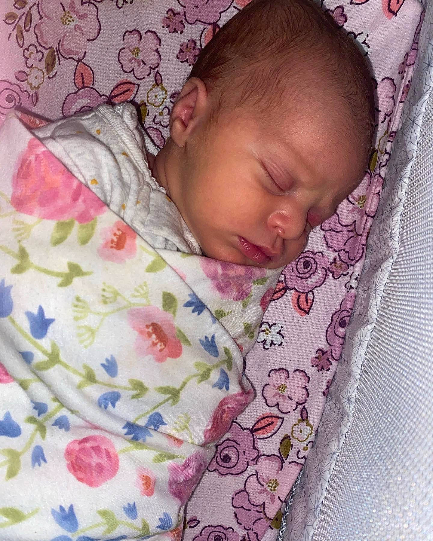 Raelyn joined the competition — help win amazing prizes! baby, baby_products, baby_sleeping, baby_toddler_clothing, bed, bedding, bedtime, cheek, child, comfort, infant_bed, linens, lip, pattern, person, pink, product, skin, sleeve, textile