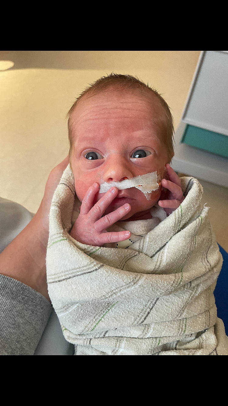 Teagan is registered to the contest to win money with this photo: arm, baby, cheek, comfort, ear, eyelash, finger, gesture, happy, human_body, iris, jaw, lip, mouth, nail, neck, nose, person, skin, thumb