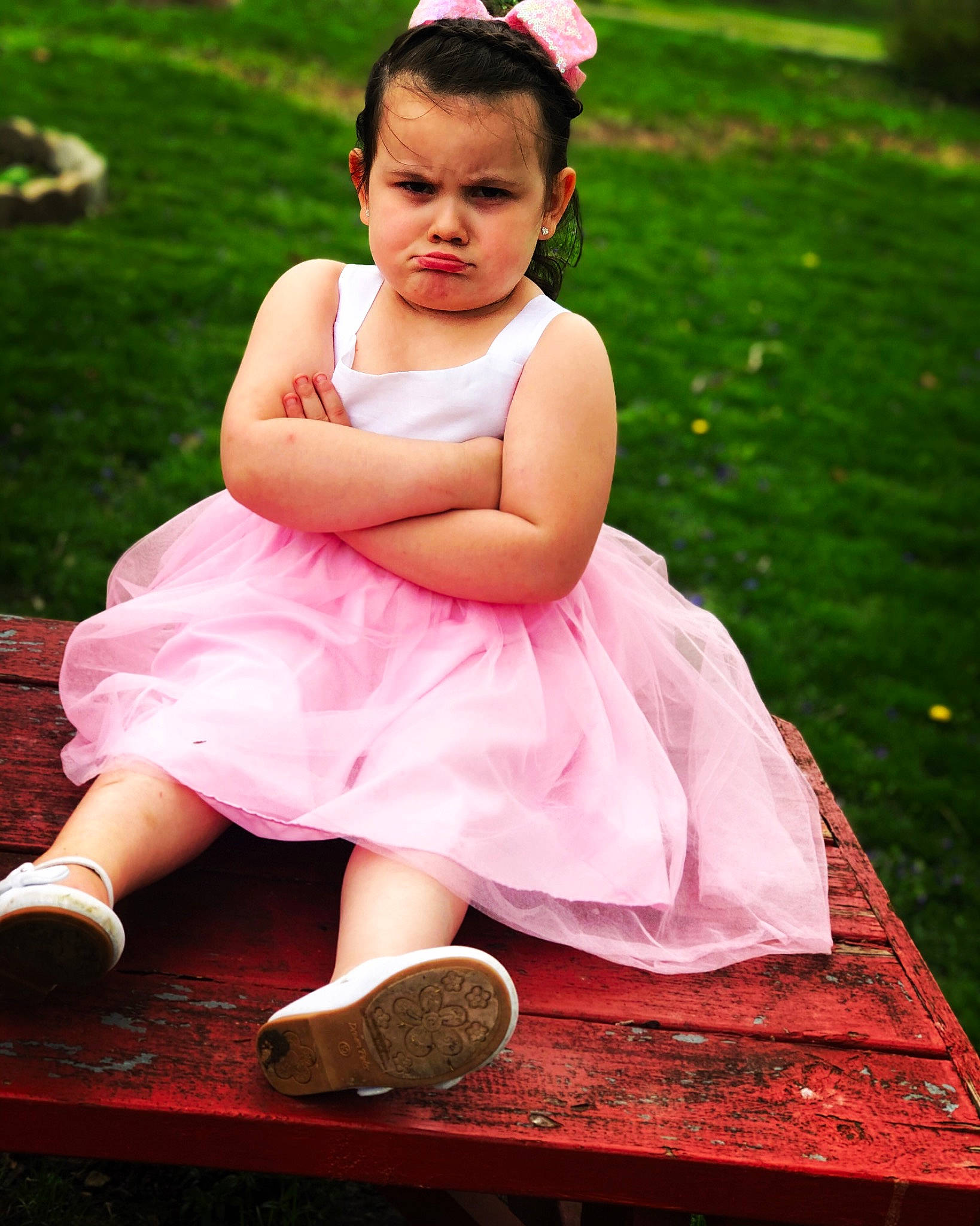 Taylynn joined the competition — help win amazing prizes! beauty, ceremony, child, child_model, costume, dress, grass, happy, person, photography, pink, sitting, skin, smile, toddler
