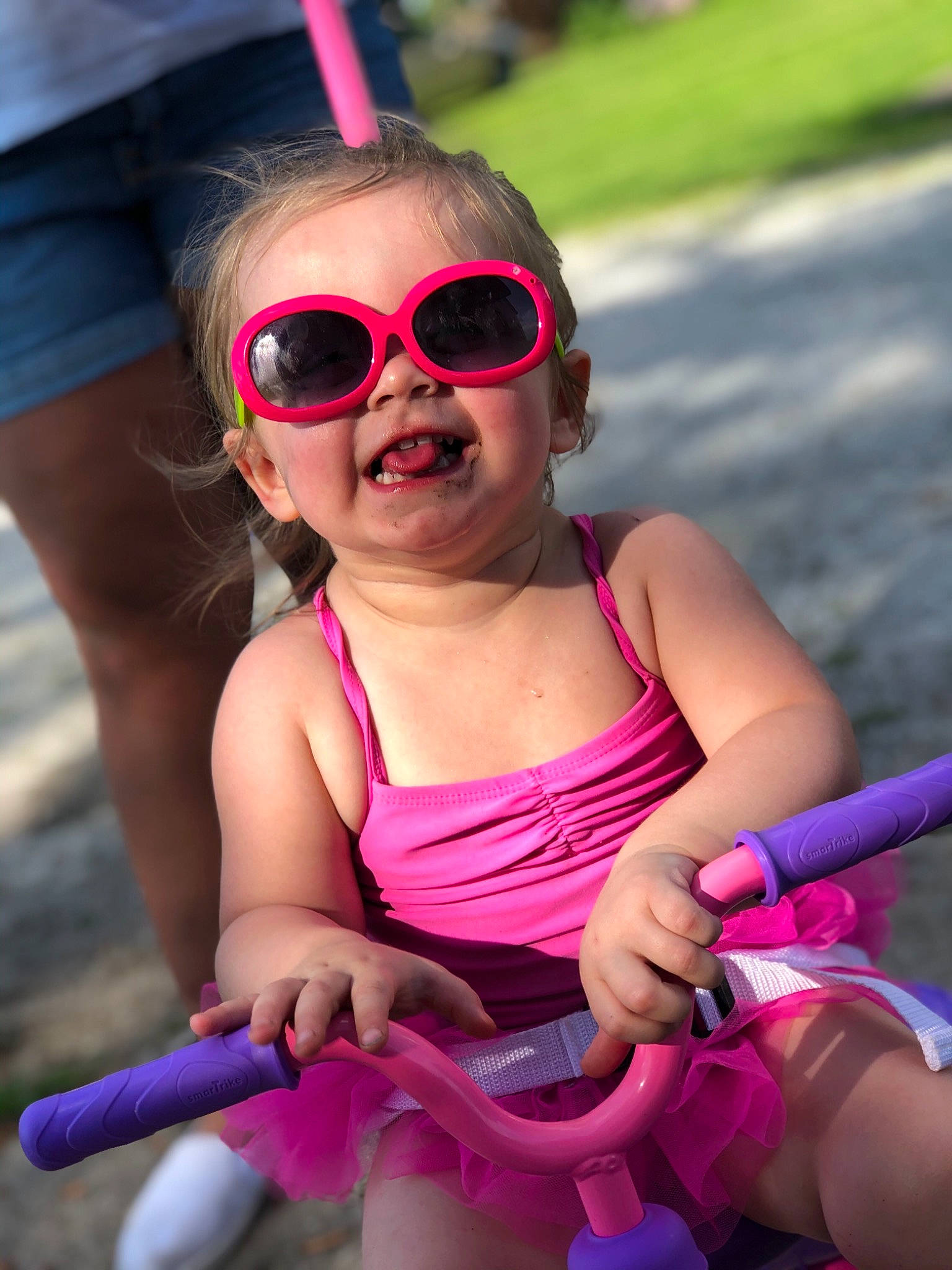 Teagyn is registered to the contest to win money with this photo: child, cool, eyewear, fun, glasses, leisure, lip, magenta, people, person, personal_protective_equipment, pink, play, purple, recreation, smile, summer, sunglasses, toddler, vacation