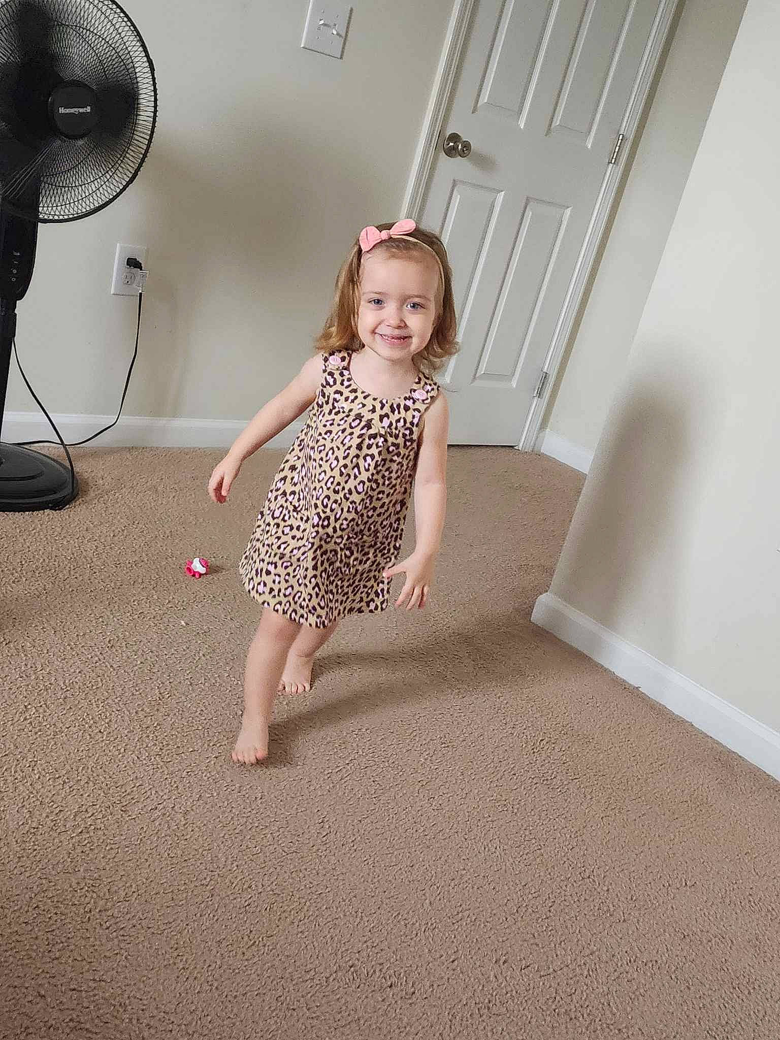 Sophi joined the competition — help win amazing prizes! baby, baby_toddler_clothing, barefoot, child, door, flash_photography, floor, flooring, foot, fun, happy, hardwood, human_leg, joy, knee, mechanical_fan, pattern, person, sleeve, toddler