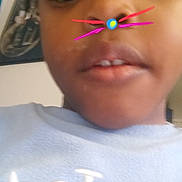 Mike participe au concours pour gagner de l'argent avec cette photo : child, face, selfie, digital_filter, cat_ears, whiskers, closeup, blurry, expression, portrait, casual_clothing, indoors, playful, young, person, head, hair, skin, eyes, nose