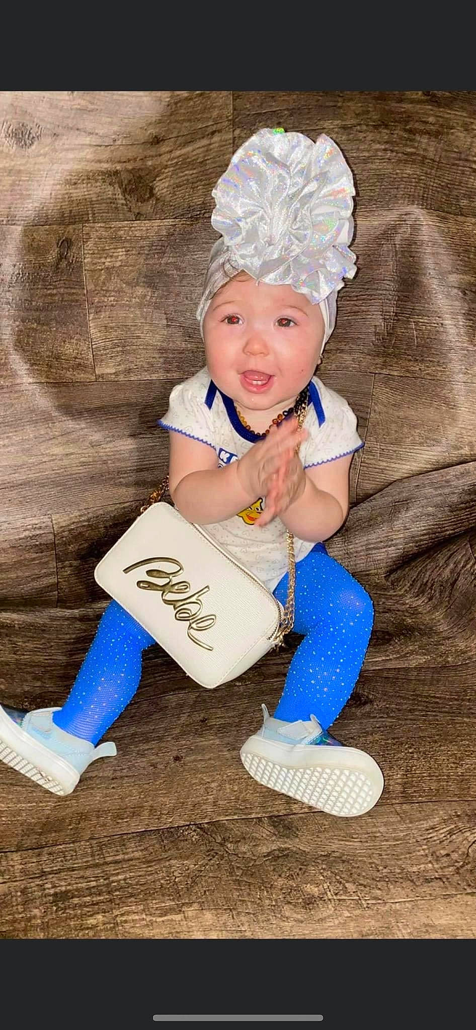 Arizona joined the competition — help win amazing prizes! baby, baby_toddler_clothing, child, costume_hat, electric_blue, face, fashion_accessory, flash_photography, fun, grass, happy, hat, headband, headgear, headpiece, headwear, person, sitting, sleeve, smile