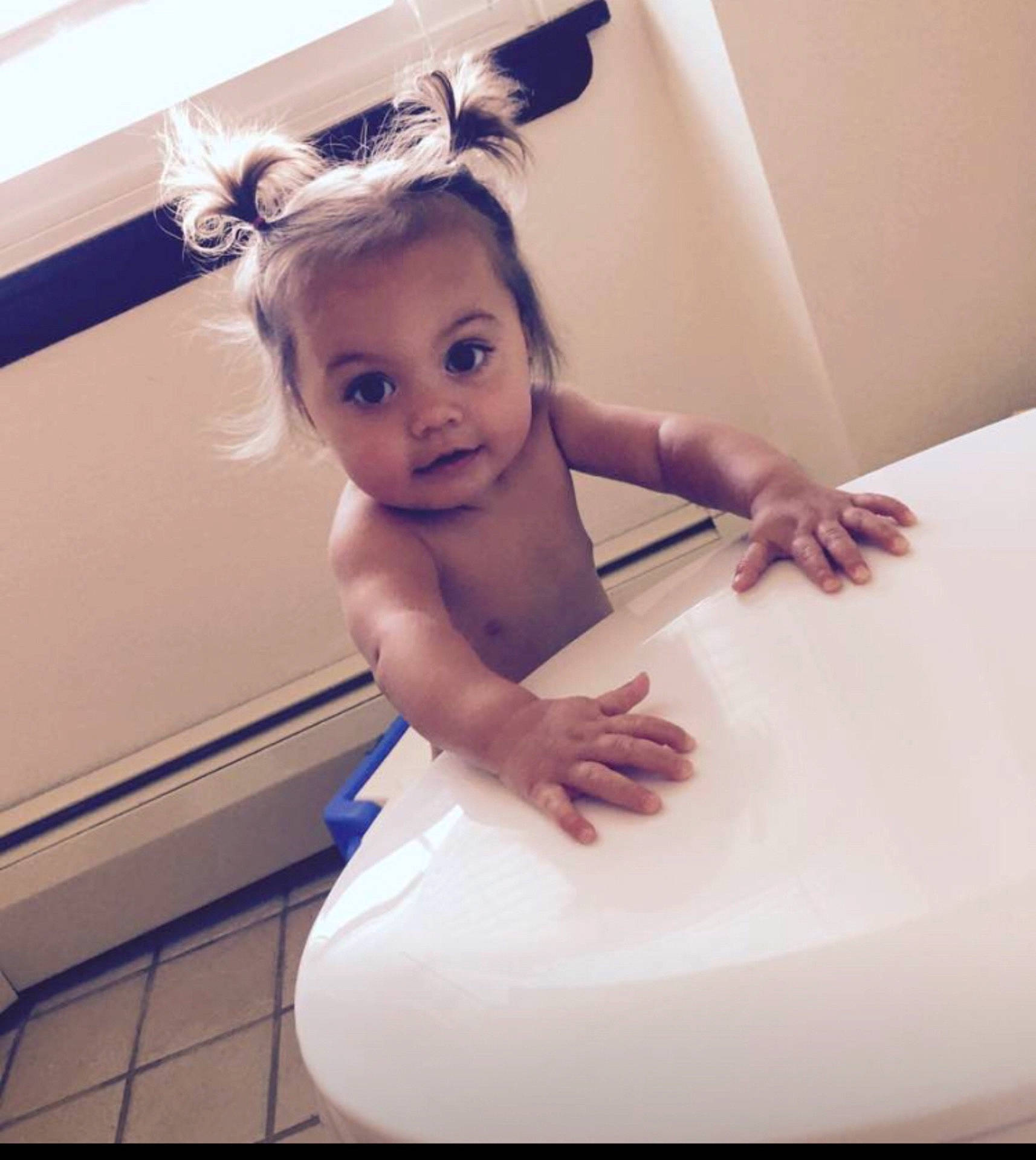 Bella is registered to the contest to win money with this photo: arm, child, flooring, girl, hair_accessory, human_hair_color, joint, leg, neck, person, shoulder, toddler