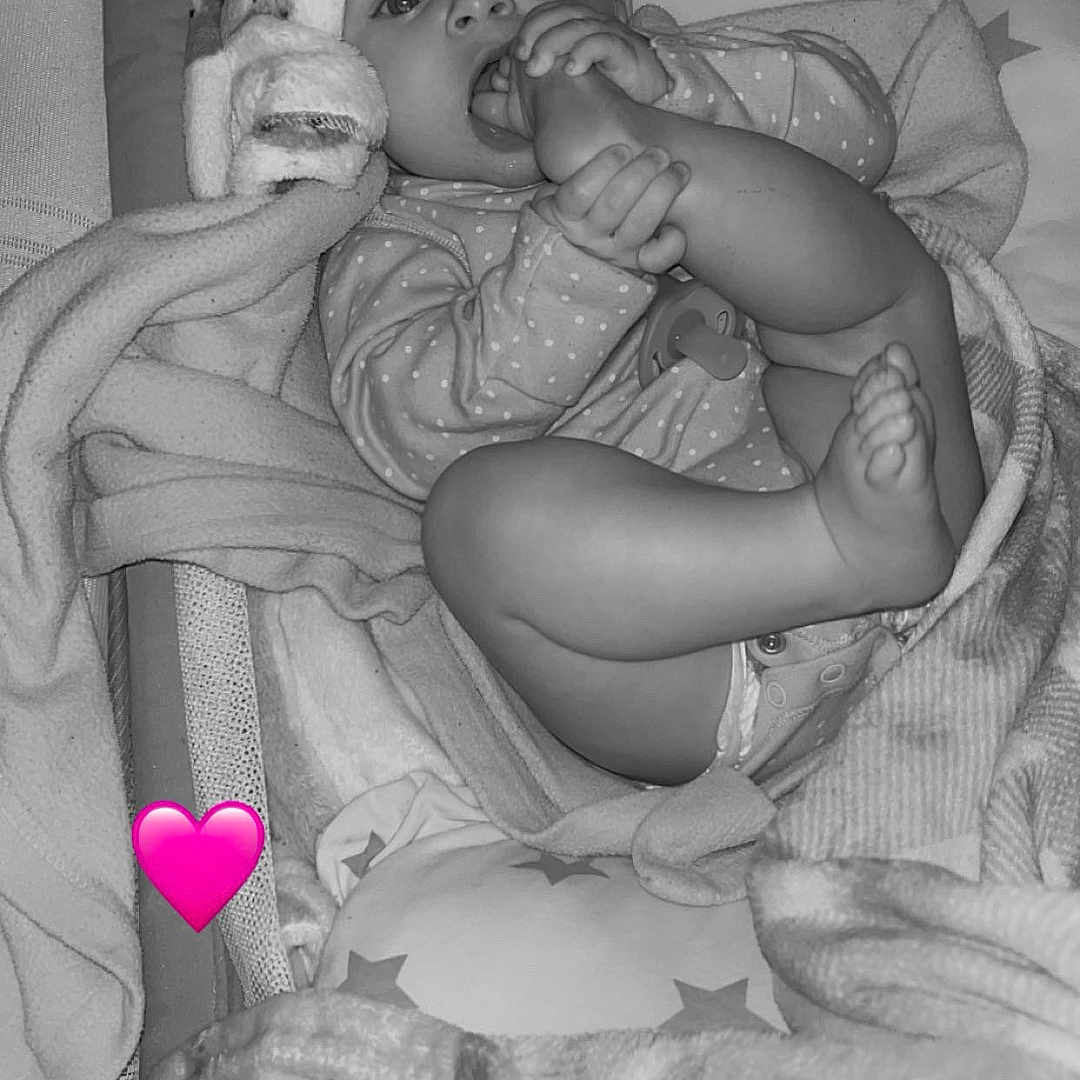 Esmee is registered to the contest to win money with this photo: adult, baby, bed, blanket, bodypart, bride, crib, face, female, finger, furniture, hand, head, infantbed, newborn, person, photography, portrait, wedding, woman