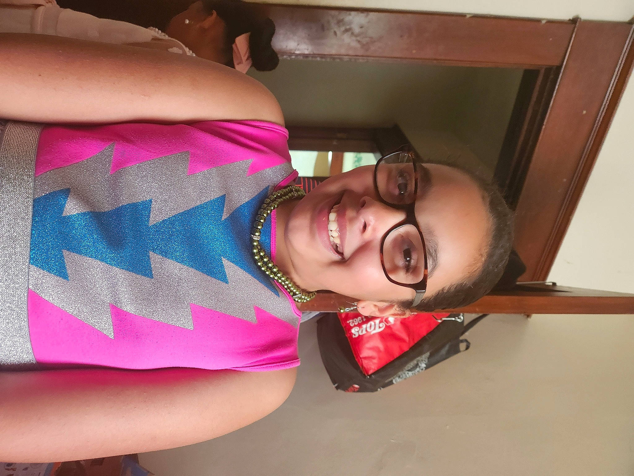 Kiara joined the competition — help win amazing prizes! chest, elbow, eyelash, eyewear, fun, glasses, happy, human_leg, joint, joy, magenta, mouth, neck, person, room, shoulder, smile, thigh, throat, trunk