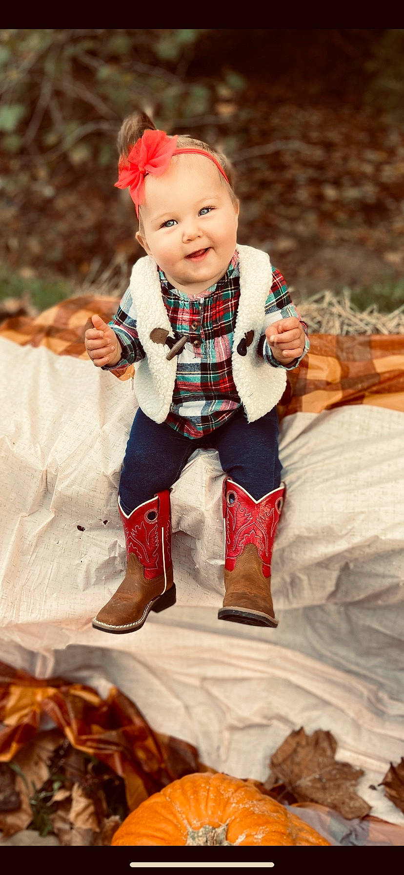 Chevelle is registered to the contest to win money with this photo: autumn, baby, child, child_model, costume, design, joy, pattern, person, plaid, sitting, smile, tartan, textile, toddler