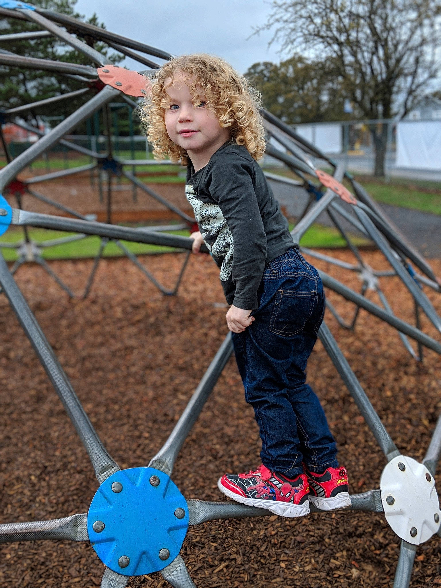 Rhydian joined the competition — help win amazing prizes! child, city, fun, human_settlement, jeans, leisure, outdoor_play_equipment, park, person, photography, play, playground, public_space, recreation, smile, soil, toddler, tree, wheel