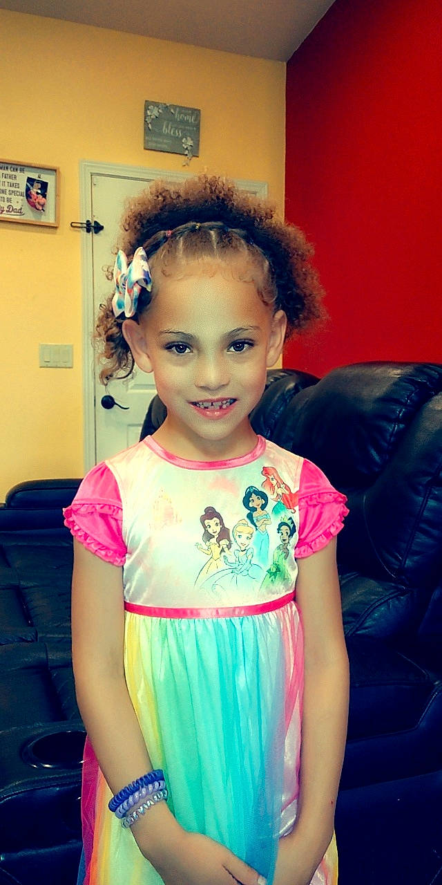 Miracle is registered to the contest to win money with this photo: baby_toddler_clothing, cheek, cool, day_dress, dress, eyebrow, eyelash, facial_expression, fashion_design, fun, happy, iris, joy, long_hair, magenta, makeover, person, shoulder, skin, sleeve