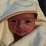 newborn, baby, towel, hooded_towel, face, eyes, wrapped, soft, cute, infant, cozy, portrait, child, clothing, fabric, texture, warm, smile, indoors, blanket