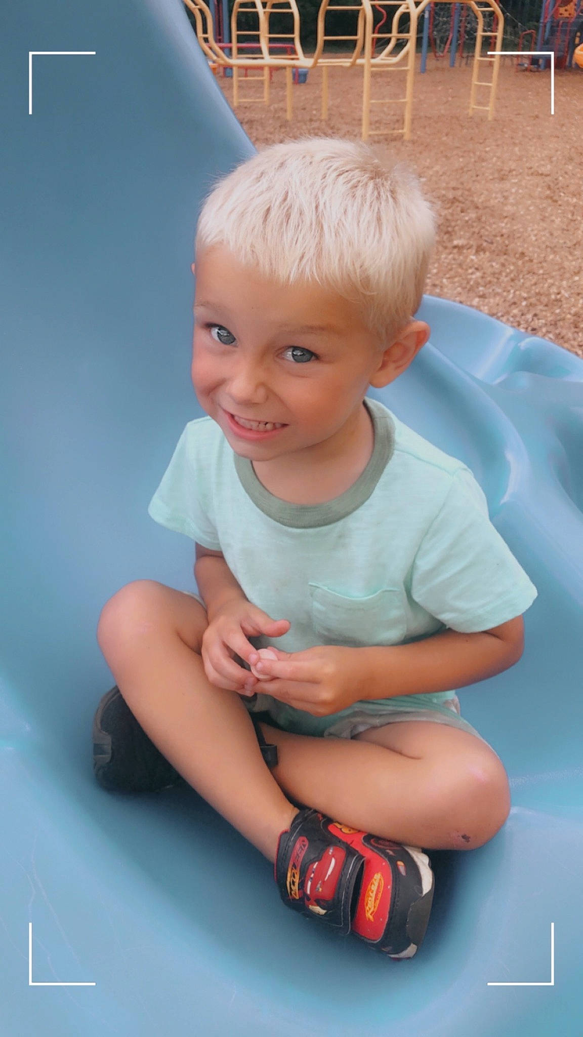 Kolten joined the competition — help win amazing prizes! baby_toddler_clothing, child, electric_blue, eye, finger, flash_photography, fun, grass, hand, happy, human_body, joy, knee, leisure, person, shorts, sitting, skin, sleeve, smile