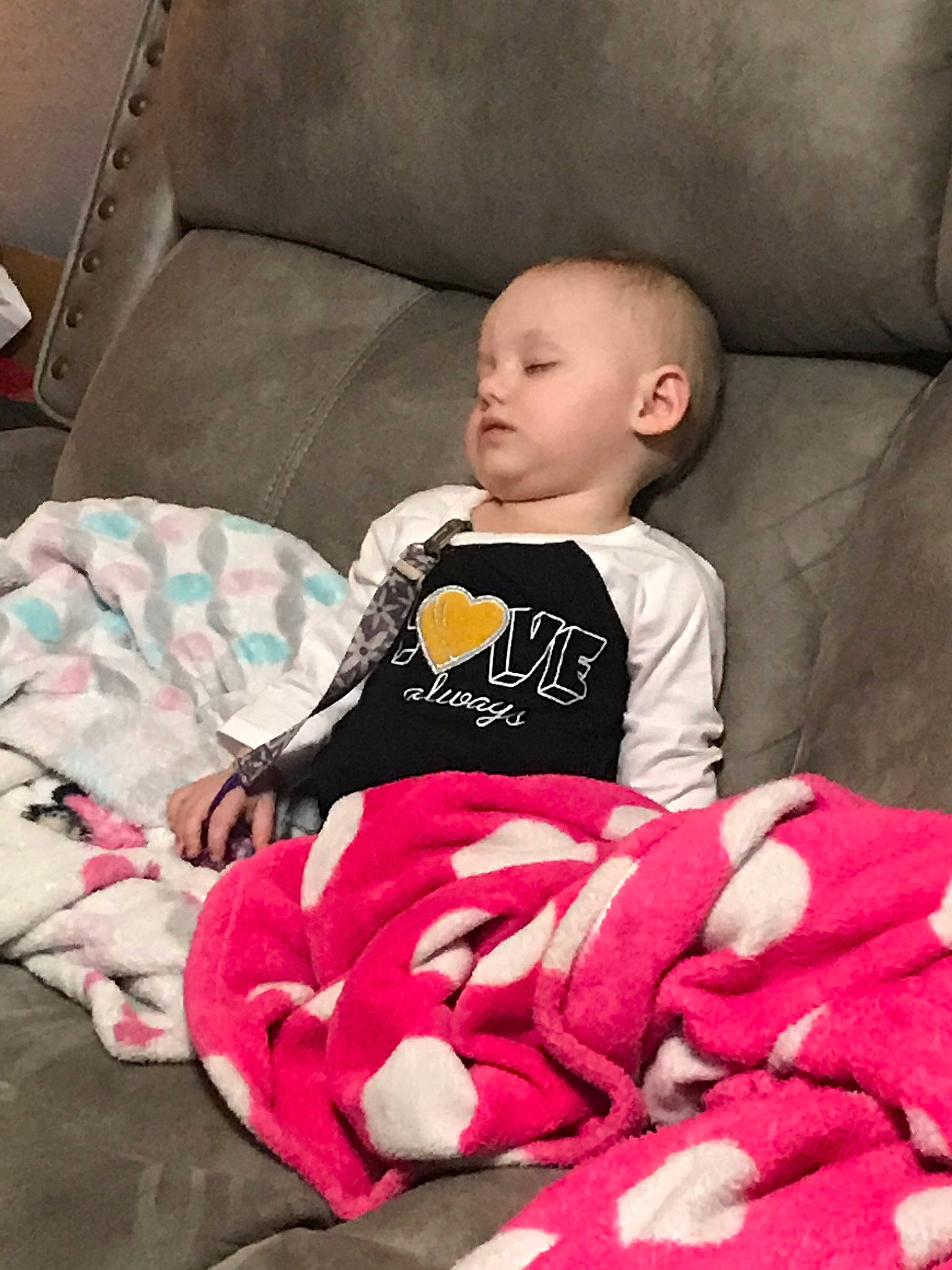 Kara is registered to the contest to win money with this photo: baby, baby_toddler_clothing, blanket, child, comfort, person, pink, toddler