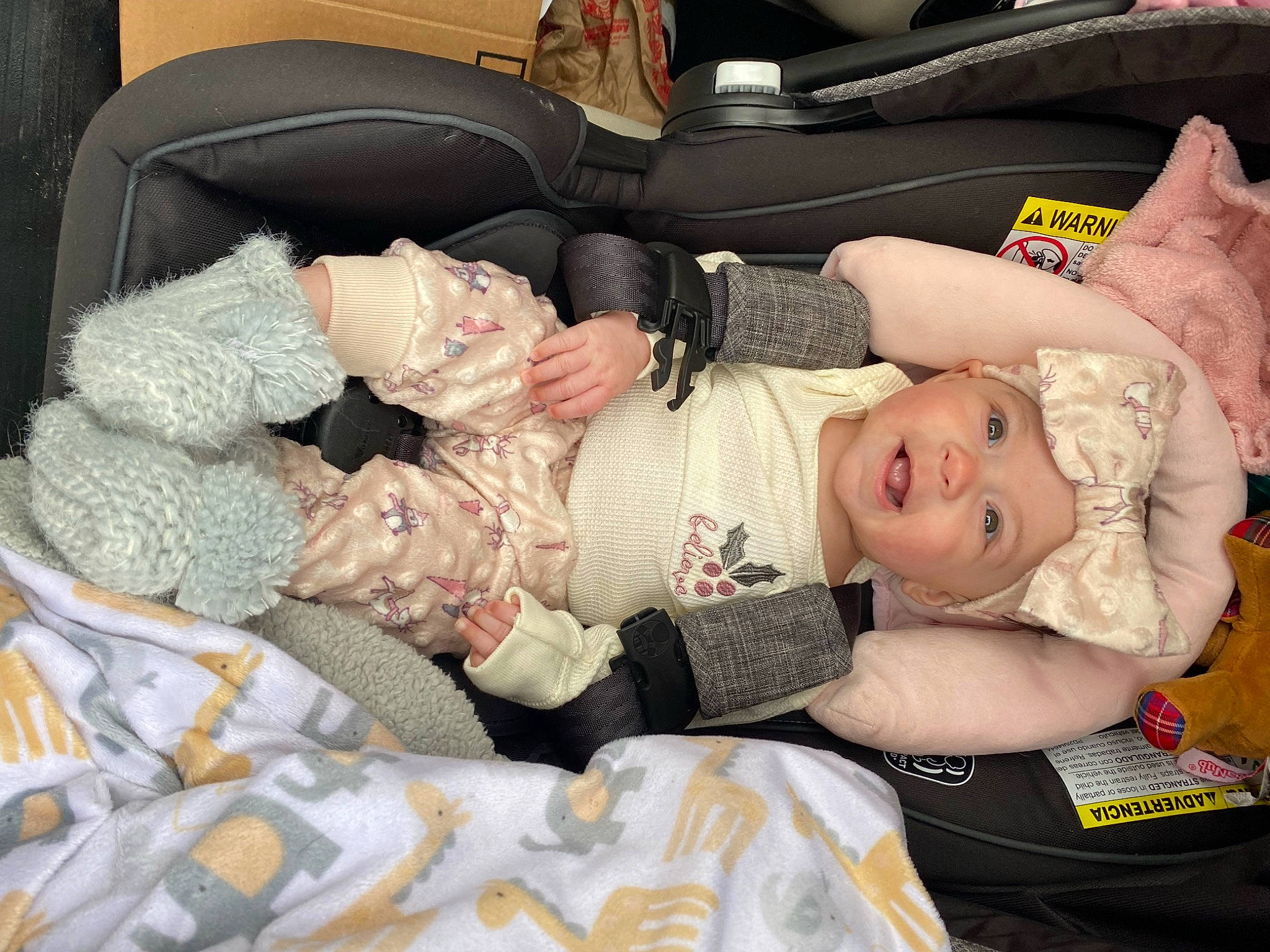 Marleigh James joined the competition — help win amazing prizes! baby, baby_carriage, baby_products, baby_safety, baby_toddler_clothing, car_seat, cheek, child, comfort, face, happy, headwear, lap, linens, pattern, person, room, sitting, sleep, smile