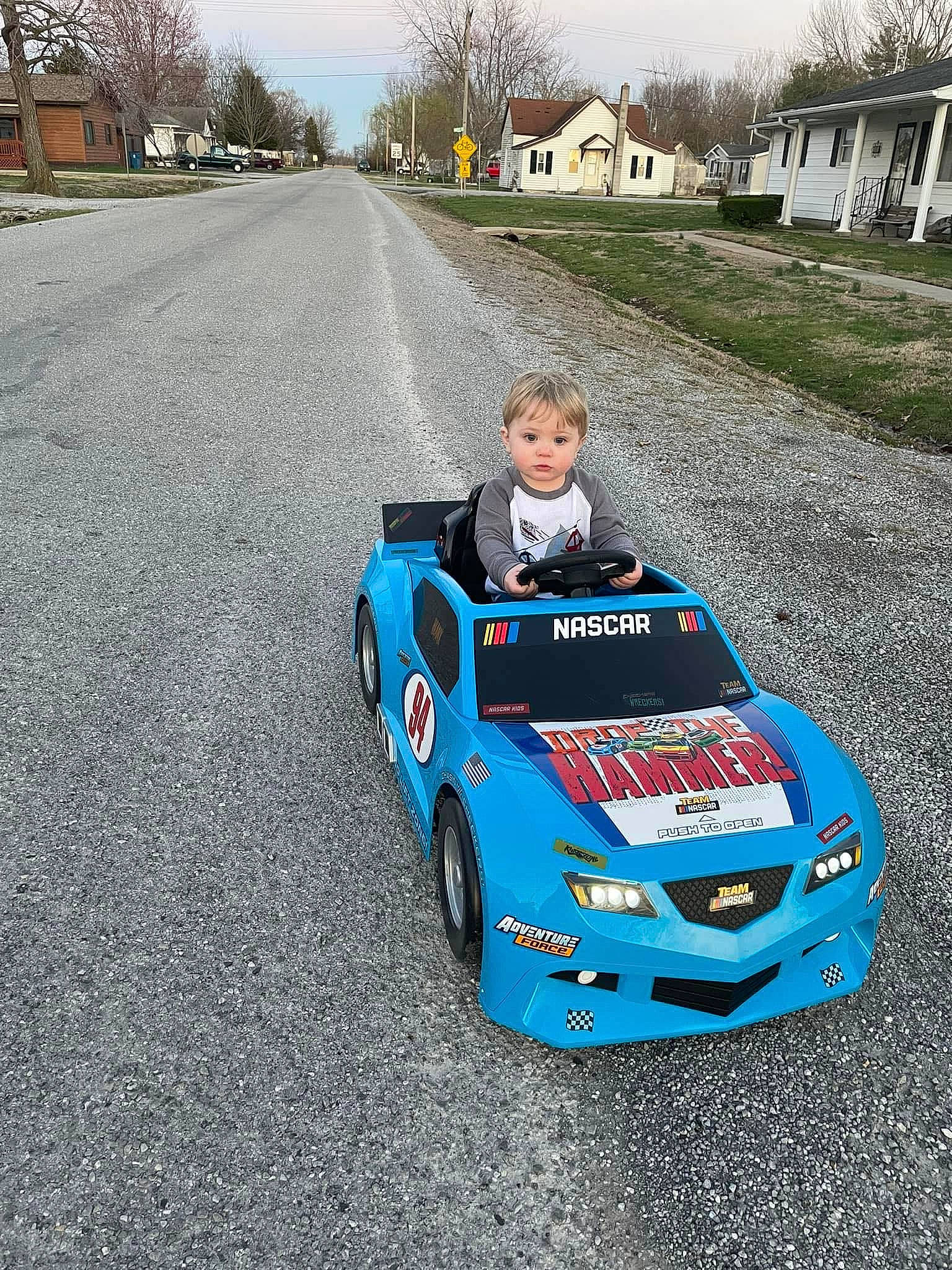 Spencer joined the competition — help win amazing prizes! alloy_wheel, asphalt, automotive_design, automotive_exterior, automotive_lighting, automotive_tire, car, hood, kit_car, mode_of_transport, motor_vehicle, person, personal_luxury_car, race_track, racing, rolling, sky, tire, tree, vehicle