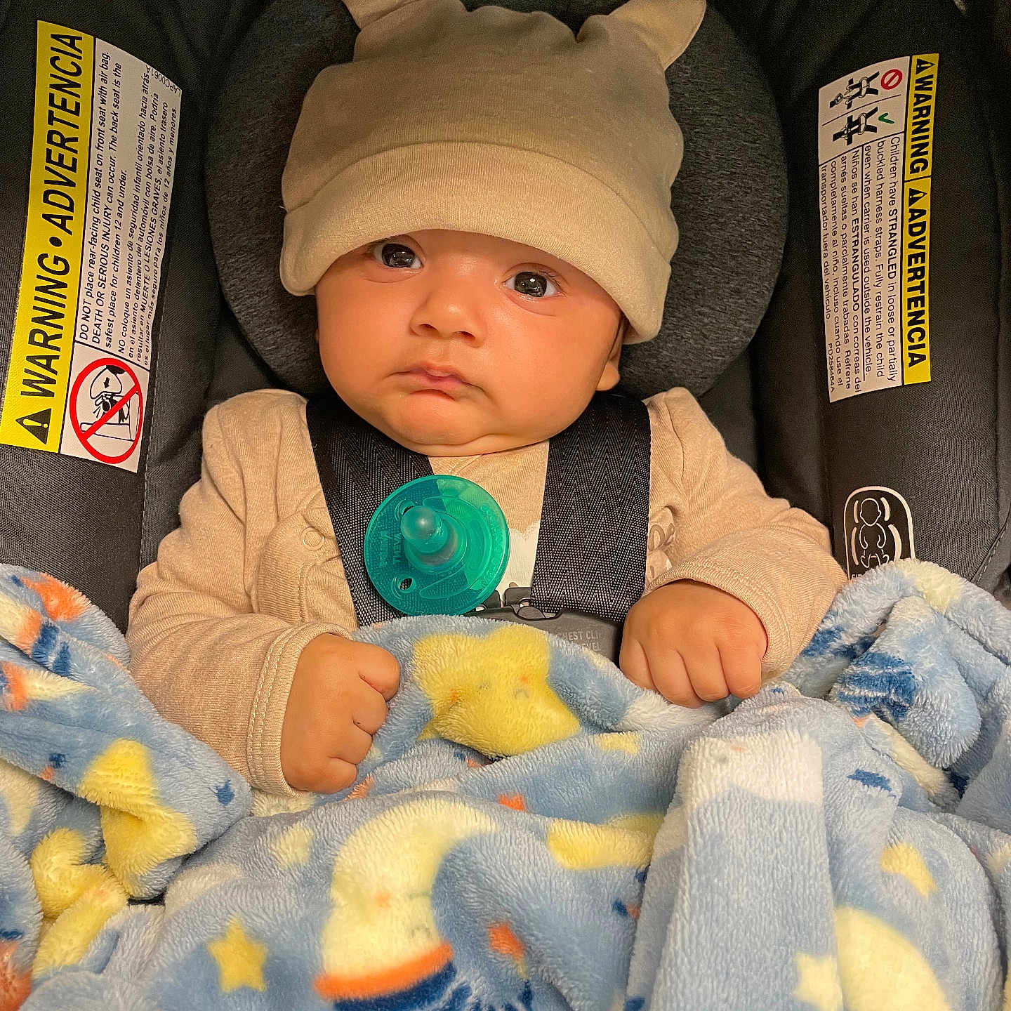 Ryder is registered to the contest to win money with this photo: baby, baseballcap, bed, blanket, bonnet, cap, car, clothing, couch, face, furniture, hat, head, newborn, person, photography, portrait, toy, transportation, vehicle