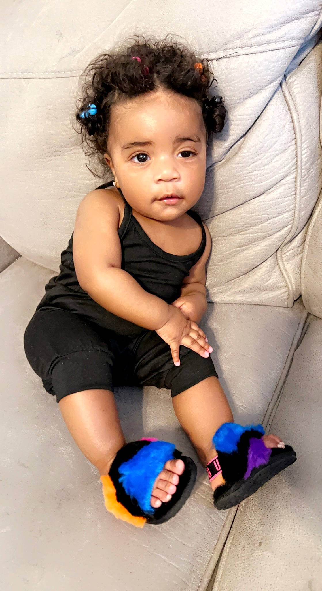 Lenox is registered to the contest to win money with this photo: arm, baby_toddler_clothing, blue, child, comfort, eye, finger, flash_photography, flooring, happy, human_body, joint, knee, organ, person, photograph, skin, smile, thigh, toddler