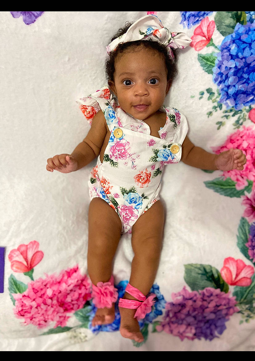 Lexington joined the competition — help win amazing prizes! baby, baby_bloomers, baby_products, baby_toddler_clothing, child, child_model, dress, fashion_accessory, flower, hair_accessory, happy, headgear, pattern, person, petal, pink, product, smile, textile, toddler