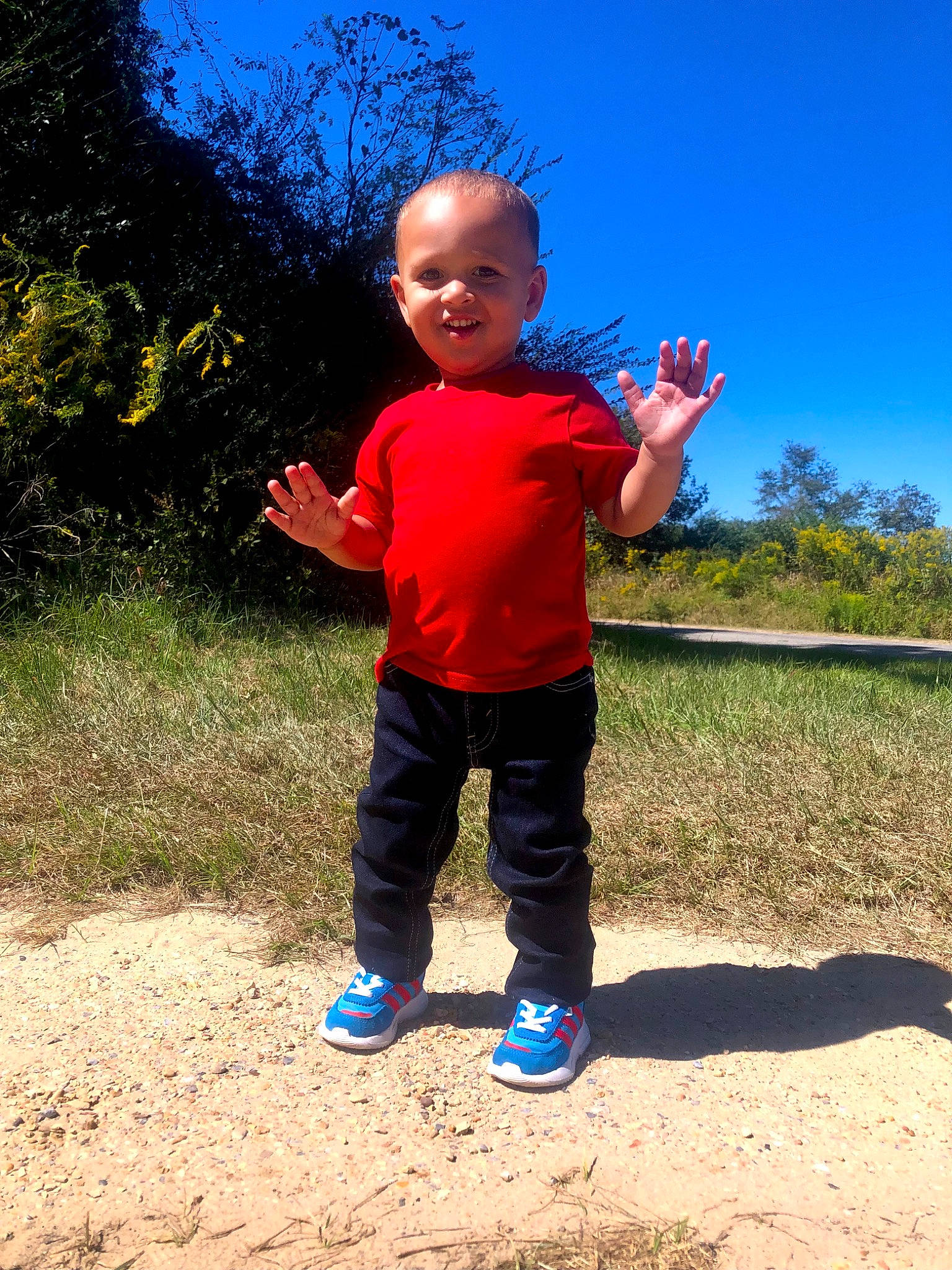 Jamarcus joined the competition — help win amazing prizes! electric_blue, finger, fun, gesture, grass, grass_family, grassland, happy, joy, landscape, leaf, leisure, people_in_nature, person, plant, recreation, sky, standing, thumb, toddler