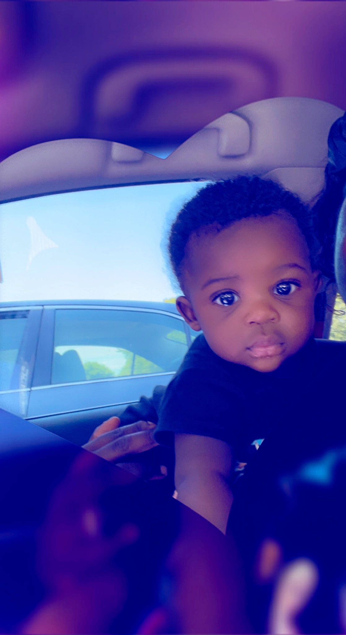 Keon is registered to the contest to win money with this photo: automotive_design, automotive_exterior, automotive_lighting, azure, blue, car, cloud, electric_blue, eyebrow, flash_photography, happy, head, hood, motor_vehicle, person, sky, tints_and_shades, toddler, vehicle, vehicle_door
