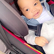 Jyaair joined the competition — help win amazing prizes! baby, child, car_seat, smiling, blanket, curly_hair, jacket, seatbelt, infant, cute, safety, portrait, indoors, happy, person, young_child, seat, clothing, baby_clothes, car_interior