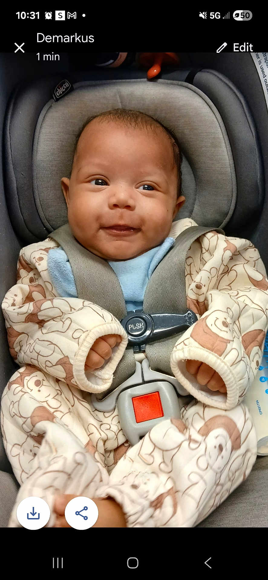 Kamarie joined the competition — help win amazing prizes! baby, infant, car_seat, child, smiling, onesie, teddy_bear_pattern, straps, safety_buckle, cute, happy, indoors, clothing, seat, person, young_child, baby_clothes, car, seatbelt, portrait