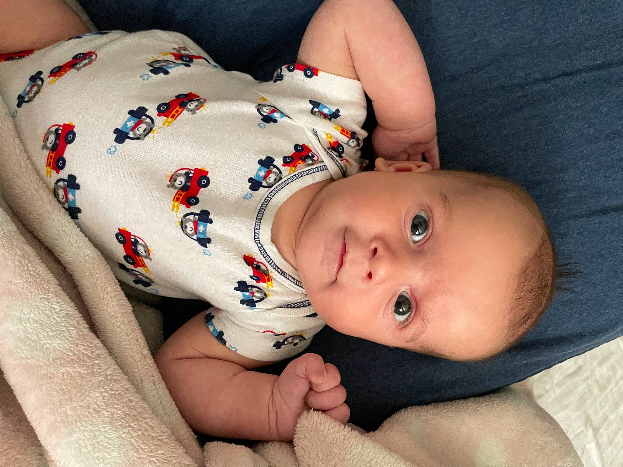 Fisher is registered to the contest to win money with this photo: abdomen, baby, baby_toddler_clothing, cheek, chest, comfort, eyelash, face, facial_expression, finger, lip, mouth, neck, nose, pattern, person, skin, sleeve, toddler, trunk