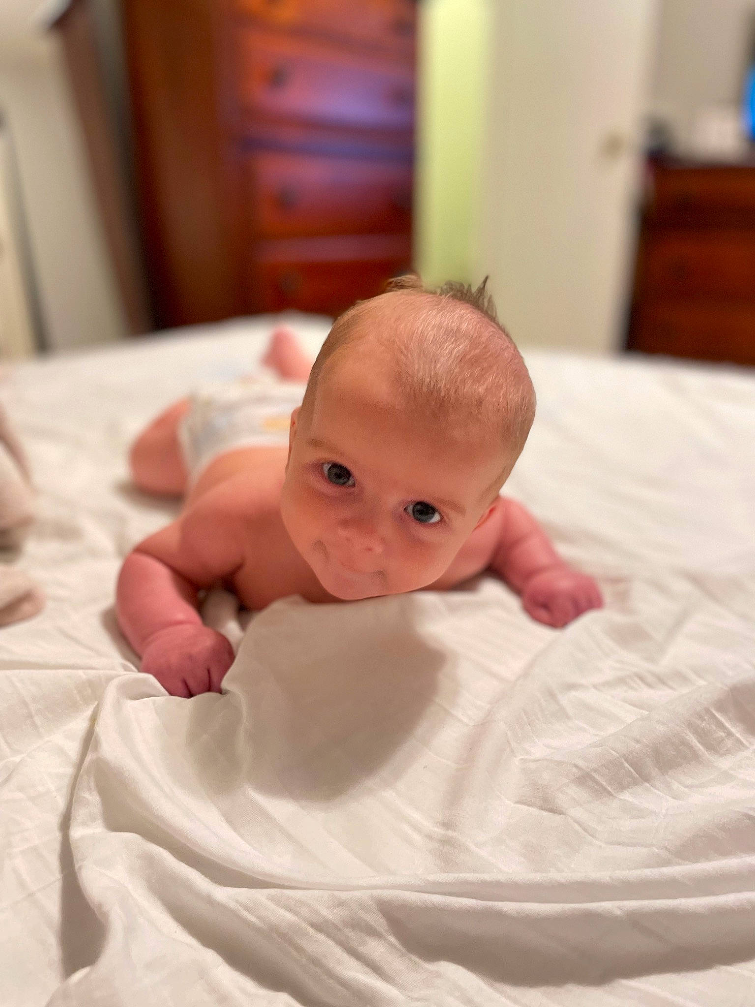 Fisher joined the competition — help win amazing prizes! baby, baby_toddler_clothing, bedding, cabinetry, cheek, child, comfort, event, flooring, fun, hardwood, linens, person, room, sitting, thumb, toddler, wood