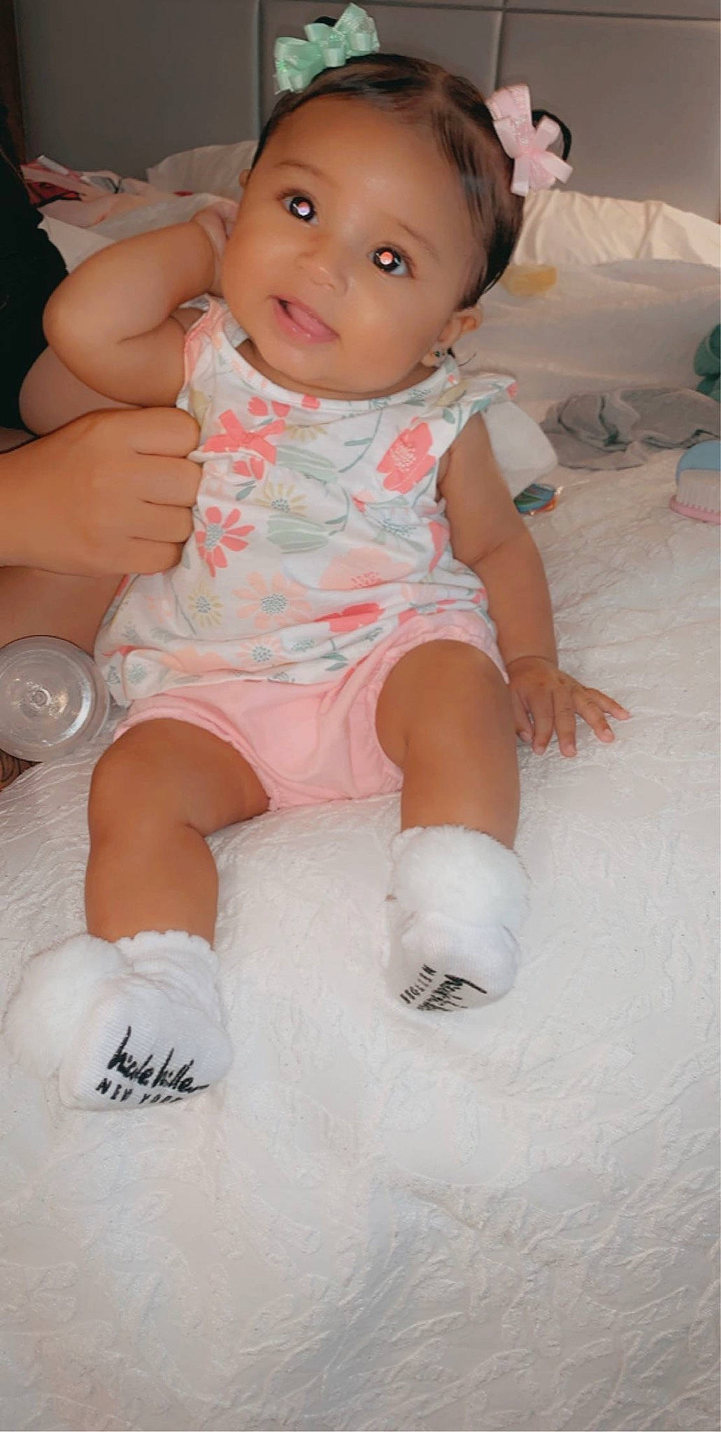 Suraya is registered to the contest to win money with this photo: ankle, baby, baby_products, baby_toddler_clothing, cheek, child, eye, foot, mouth, person, pink, plastic, skin, sock, stomach, toddler